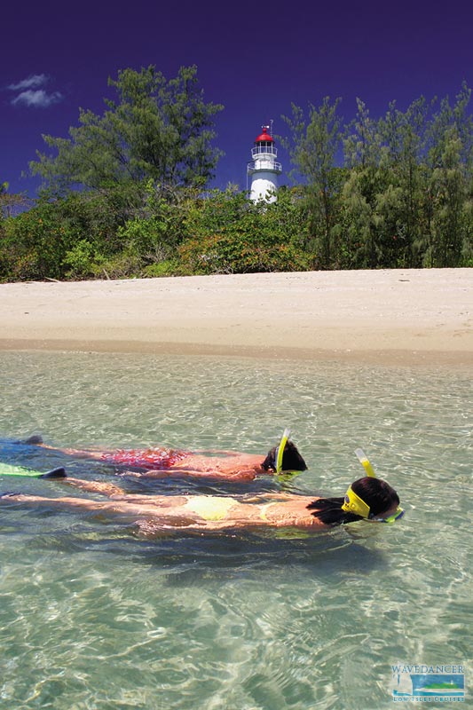 couple-snorkeling-in-front-of-low-isles